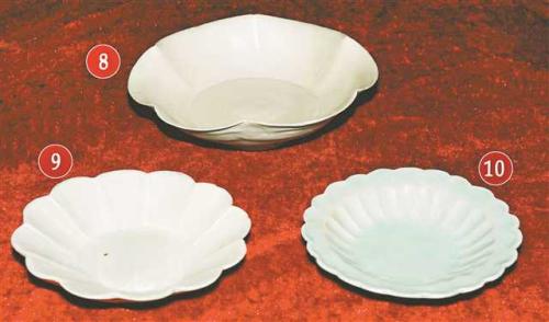 汉东古城出土的部分文物：①酱秞瓷罐、②酱秞执壶、③西坝窑窑变胆式瓷瓶、④青秞刻花瓷碟、⑤青白瓷高足碗、⑥⑦西坝窑黑秞瓷执壶、⑧青白瓷盘、⑨⑩青秞瓷碟