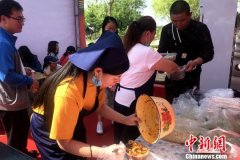 宁夏第二届大武口凉皮美食节开幕 一条街尝遍30余种特色凉皮